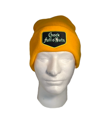 A mannequin head with a Chock full o’Nuts® Embroidered Logo Yellow Knit Hat embroidered with the phrase "check full nuts.