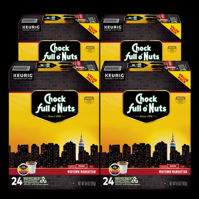 Four boxes of Chock full o'Nuts Midtown Manhattan Keurig K-Cup Pods, each containing 24 medium roast Arabica coffee pods, set against a black cityscape background.